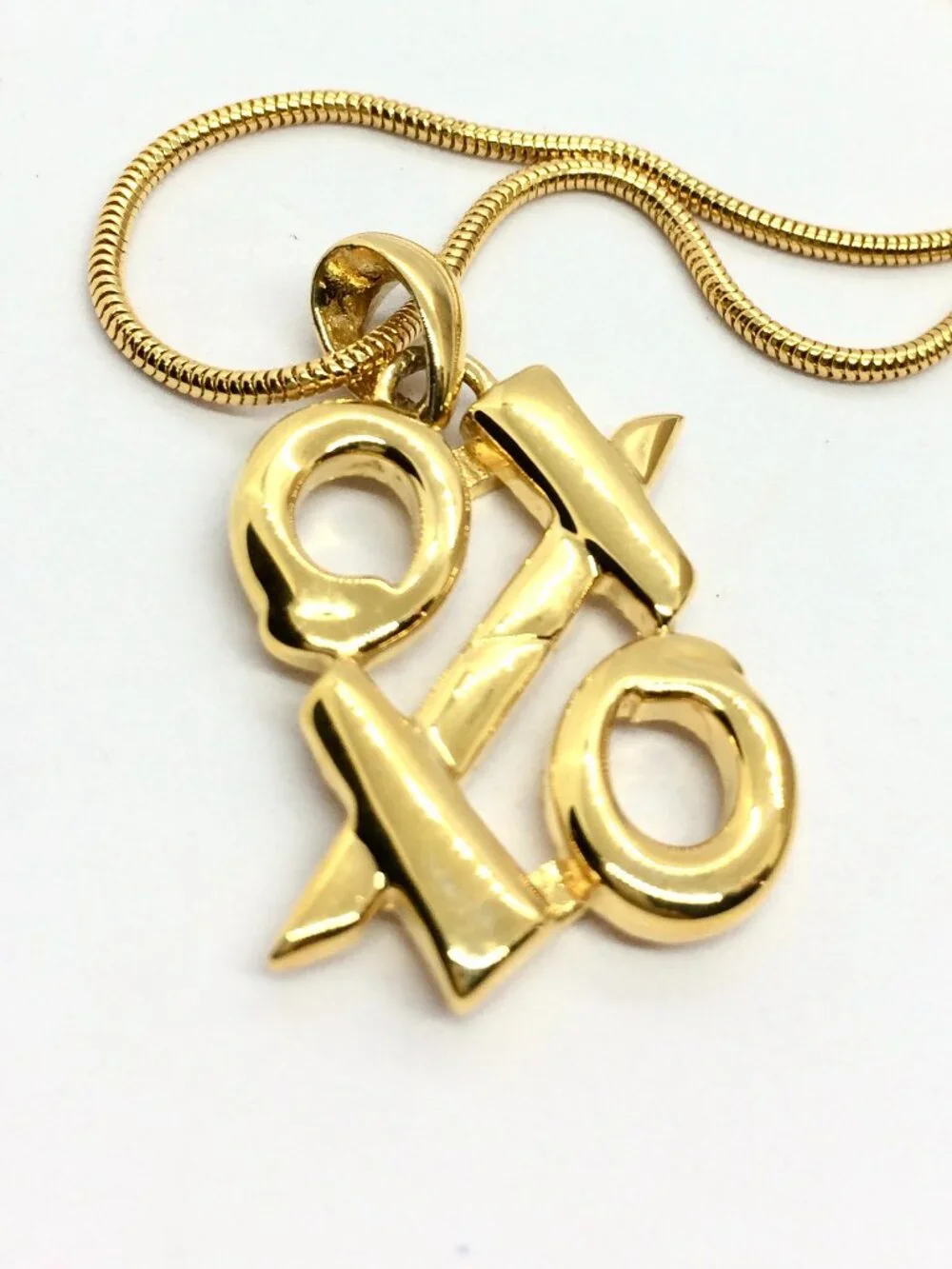 VINTAGE ANNE KLEIN Necklace Gold Tone XO Pendant Long Snake Chain